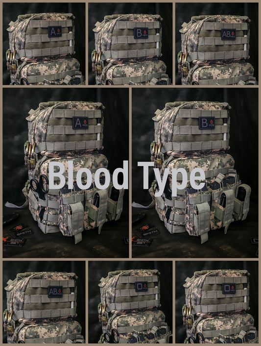 MOLLE Medical ID Tags on tactical backpack showing blood type for emergency identification.
